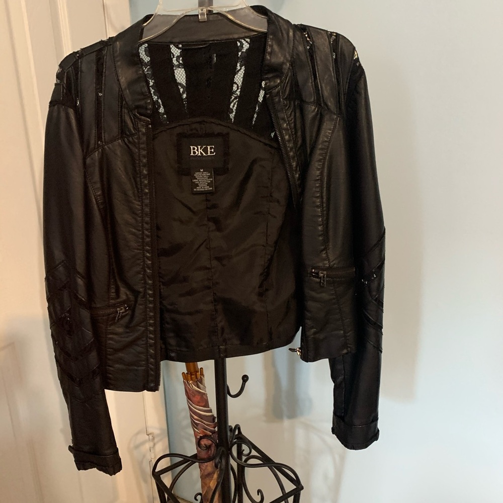 Buckle BKE faux leather jacket, size M. Beautiful lace and zipper detail.